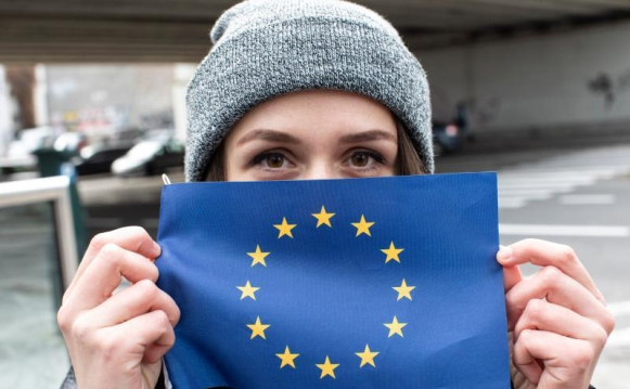 a woman with a flag covering her face